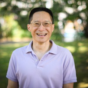 A headshot photo of Eric Liu.