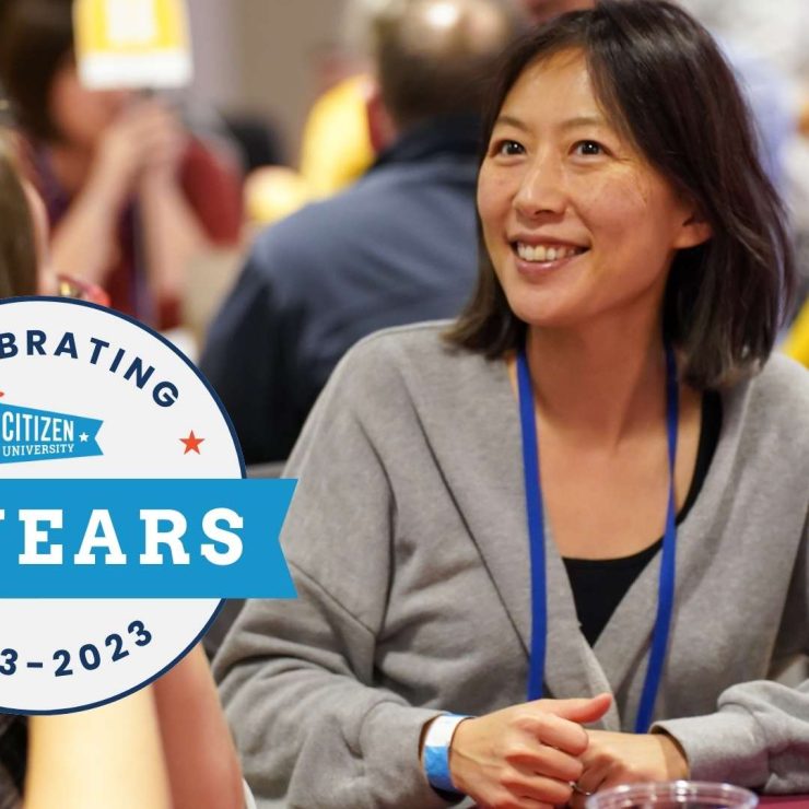 A logo for 10 years of CU on an image of a woman smiling at a table