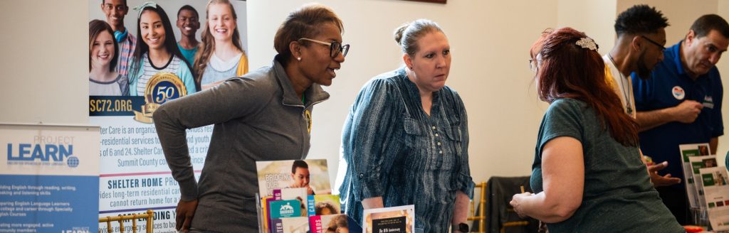A group of people chatting together