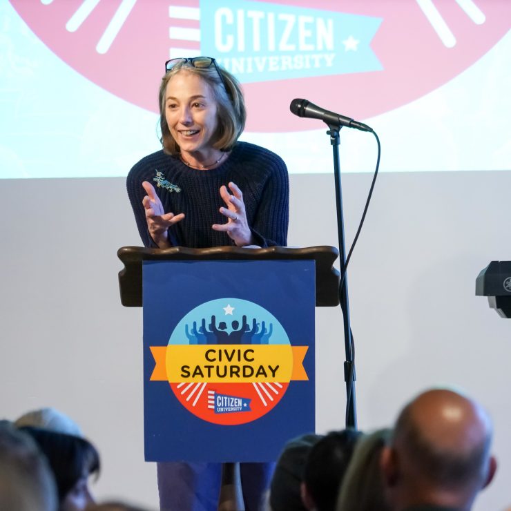 Jena Cane at the Civic Saturday podium