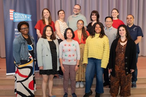 The Citizen University staff standing together and smiling for the photo.